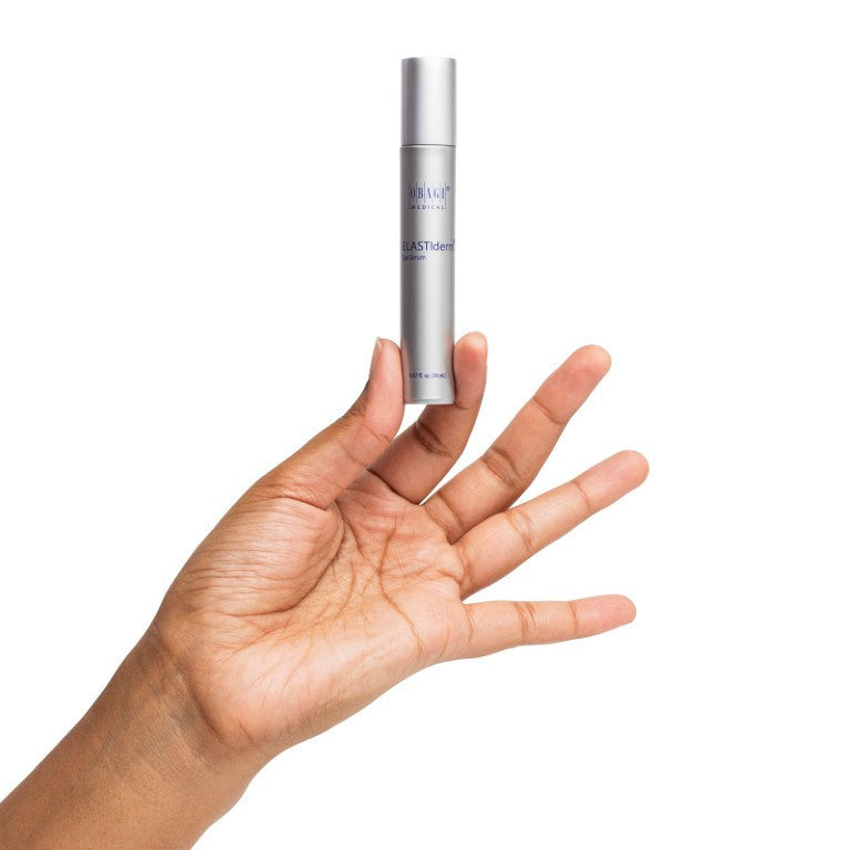 OBAGI ELASTIderm Eye Serum in hand